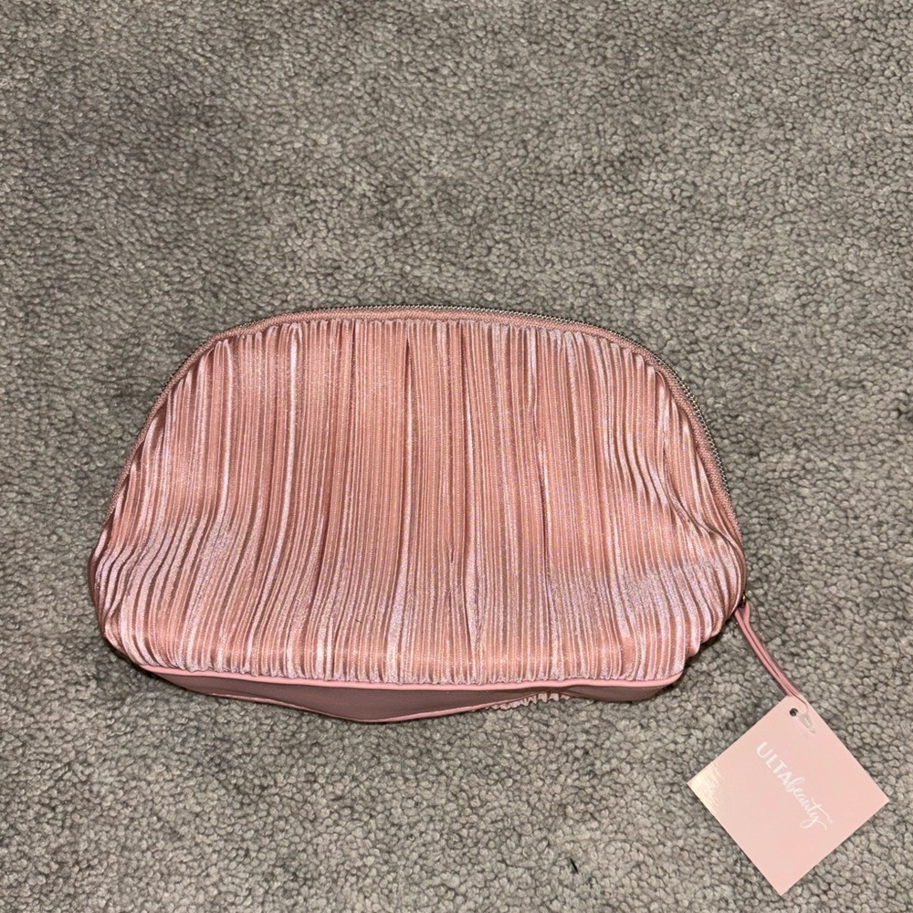 Pink ulta beauty bag, clutch, cosmetic bag, travel accessories.